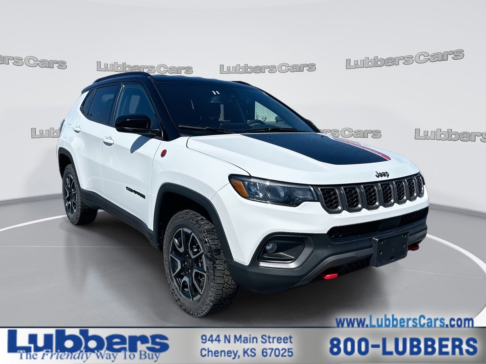 2025 Jeep Compass Trailhawk in White — front three-quarter view