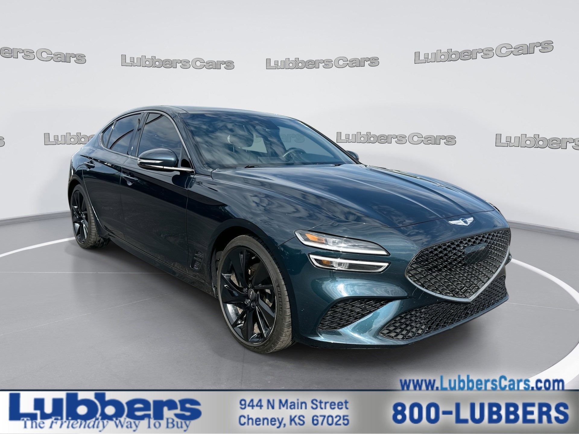 2023 Genesis G70 2.0T in Tasman Blue — front three-quarter view