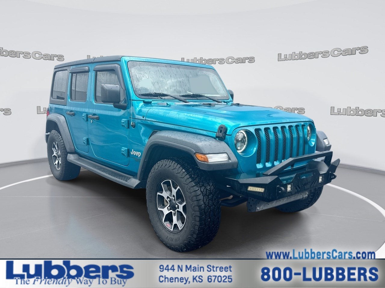 2019 Jeep Wrangler Unlimited Sport S in Bikini Pearlcoat — front three-quarter view