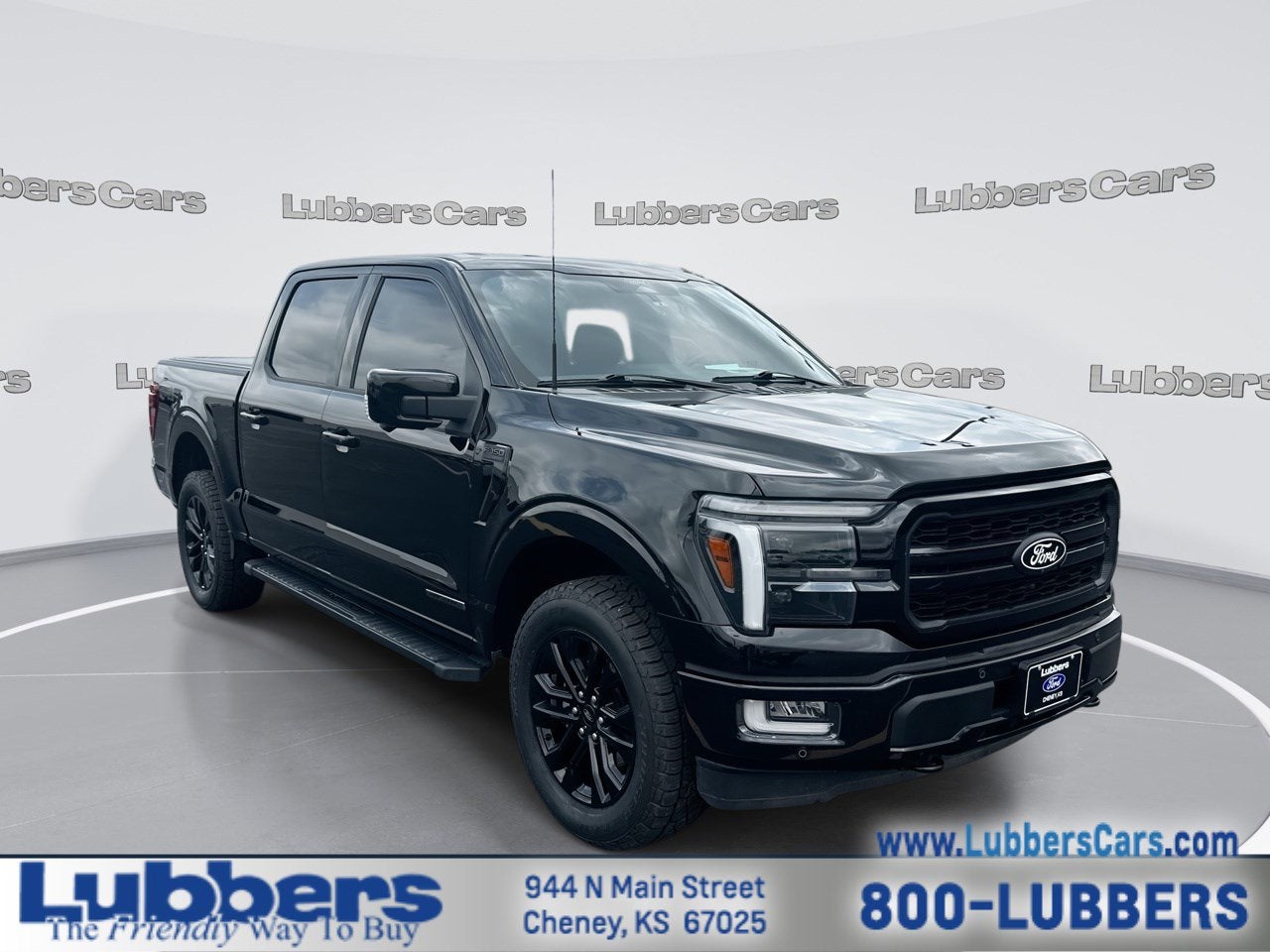 2024 Ford F-150 LARIAT in Agate Black Metallic — front three-quarter view